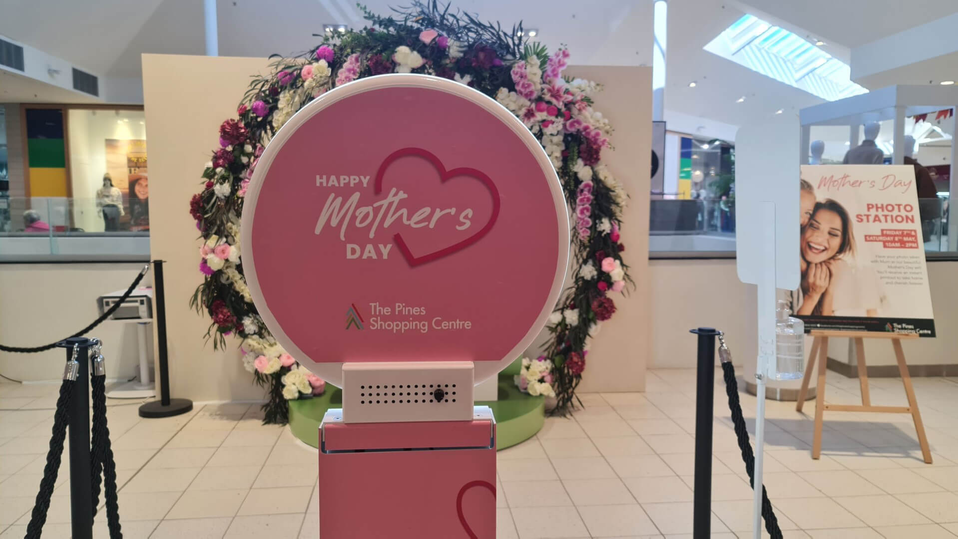 close up of a pink photo station set up to take pictures for mothers day at a shopping centre